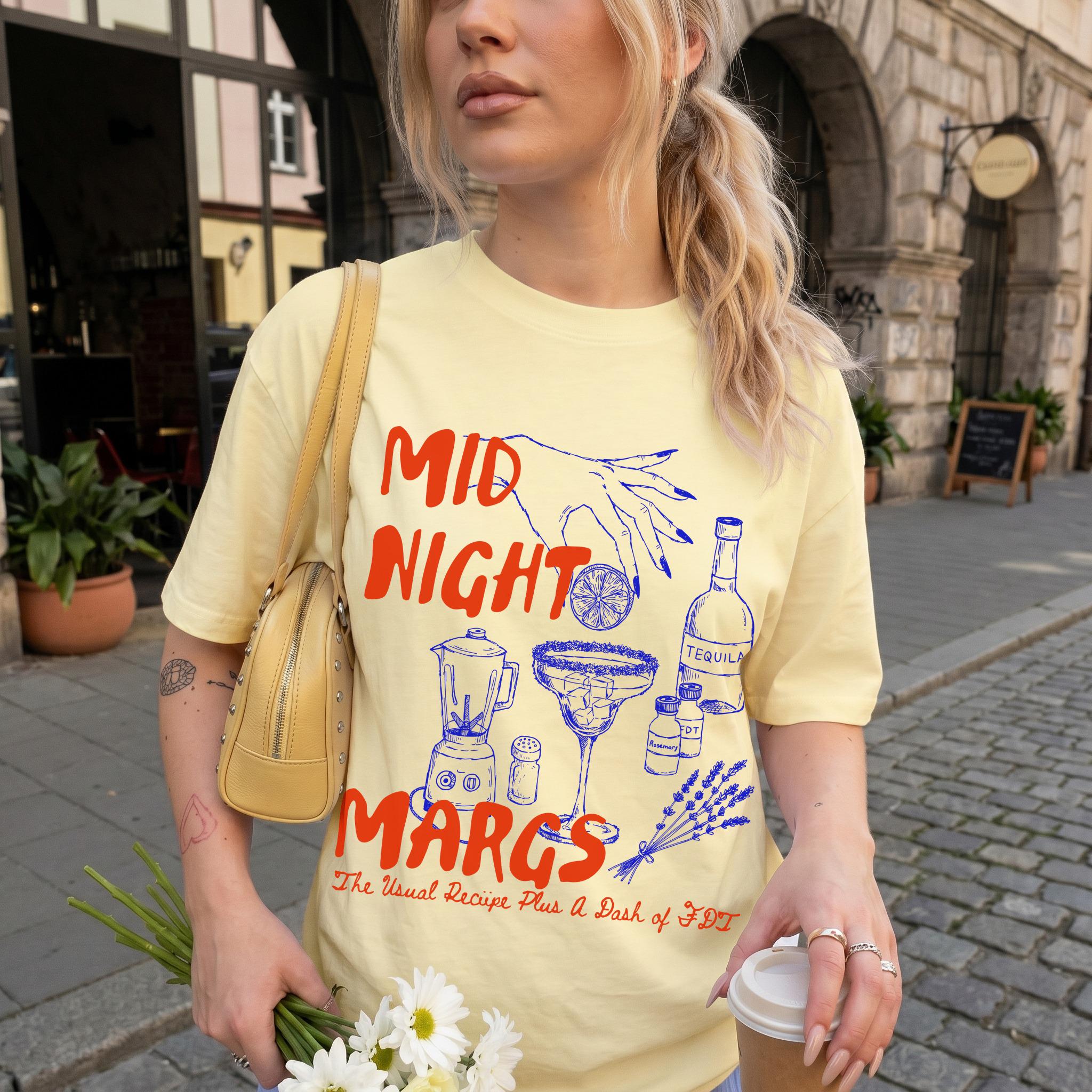 Yellow t-shirt with &amp;quot;MID NIGHT MARGS&amp;quot; text and margarita ingredients illustration.