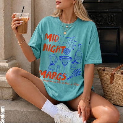 Teal t-shirt with &amp;quot;MIDNIGHT MARGS&amp;quot; graphic, blender, margarita, and tequila.