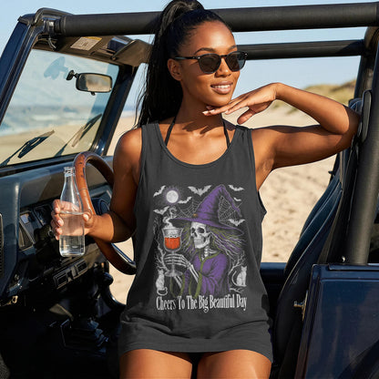 Black tank top with skeleton witch graphic and text &amp;quot;Cheers To The Big Beautiful Day&amp;quot;.