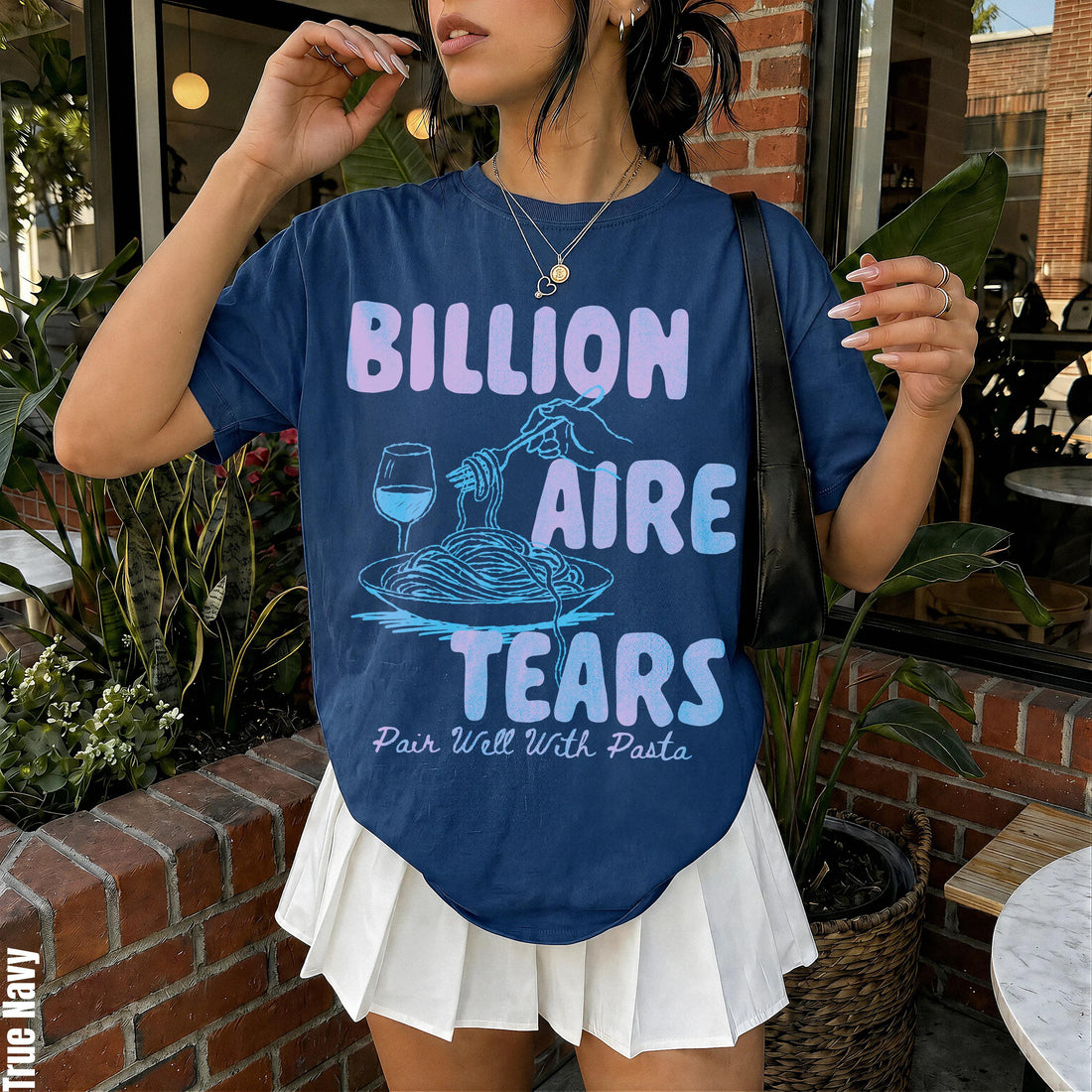 Navy t-shirt with &amp;quot;Billionaire Tears Pair Well With Pasta&amp;quot; graphic and spaghetti illustration.