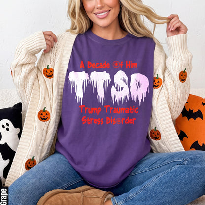 Purple t-shirt with white dripping letters &amp;quot;TTSD&amp;quot; and red text.