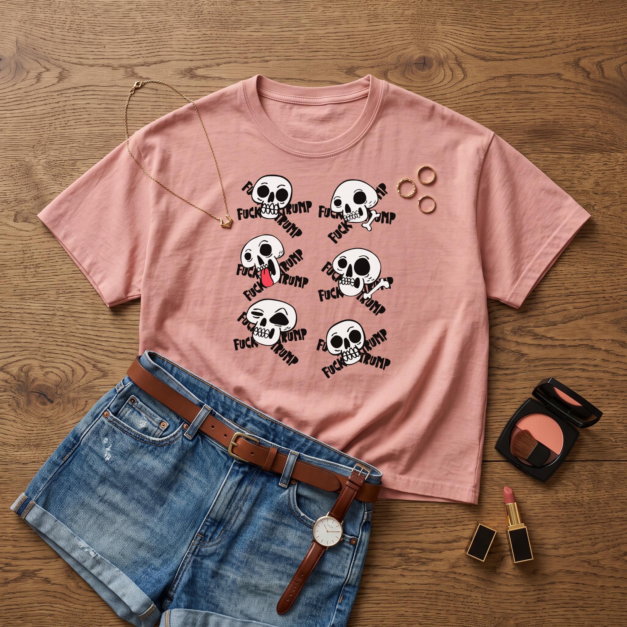 Pink t-shirt with multiple illustrations of skulls and text.