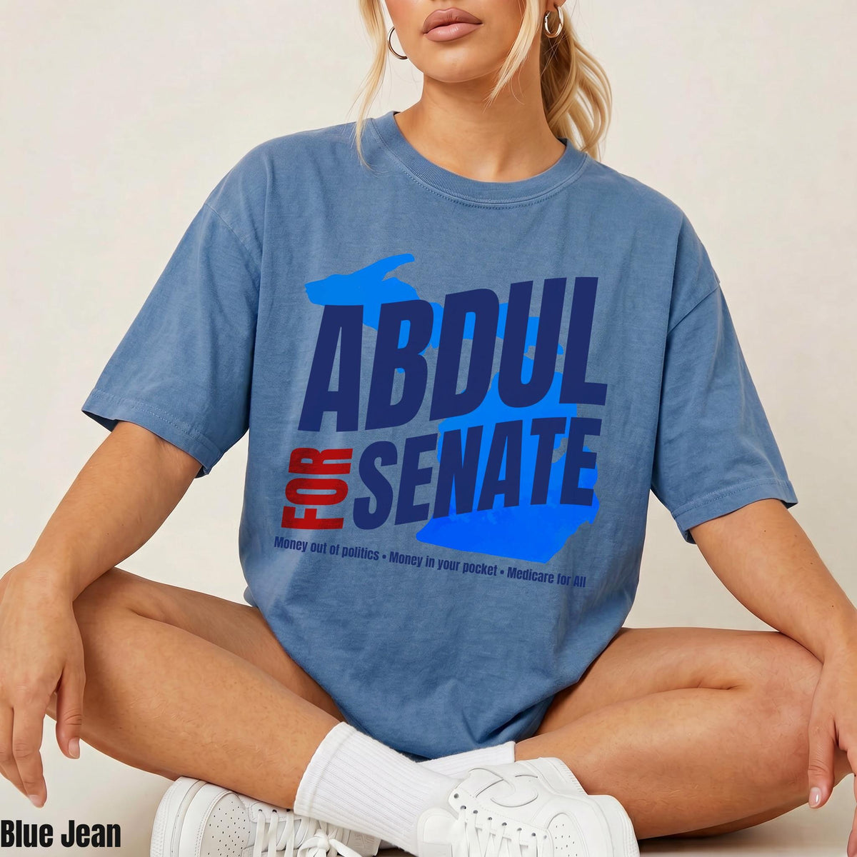 Blue t-shirt with &amp;quot;ABDUL FOR SENATE&amp;quot; and campaign slogans.