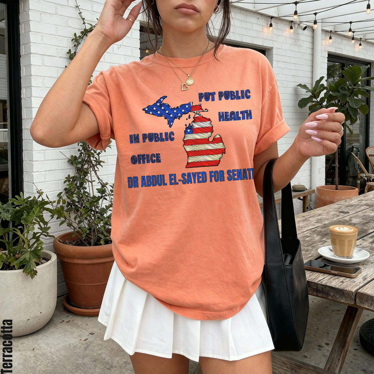 Orange t-shirt with &amp;quot;Put Public Health in Public Office&amp;quot; and Michigan map graphic.