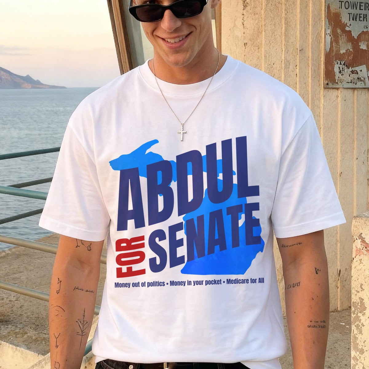 White t-shirt with &amp;quot;ABDUL FOR SENATE&amp;quot; text, lake graphic, and slogans.