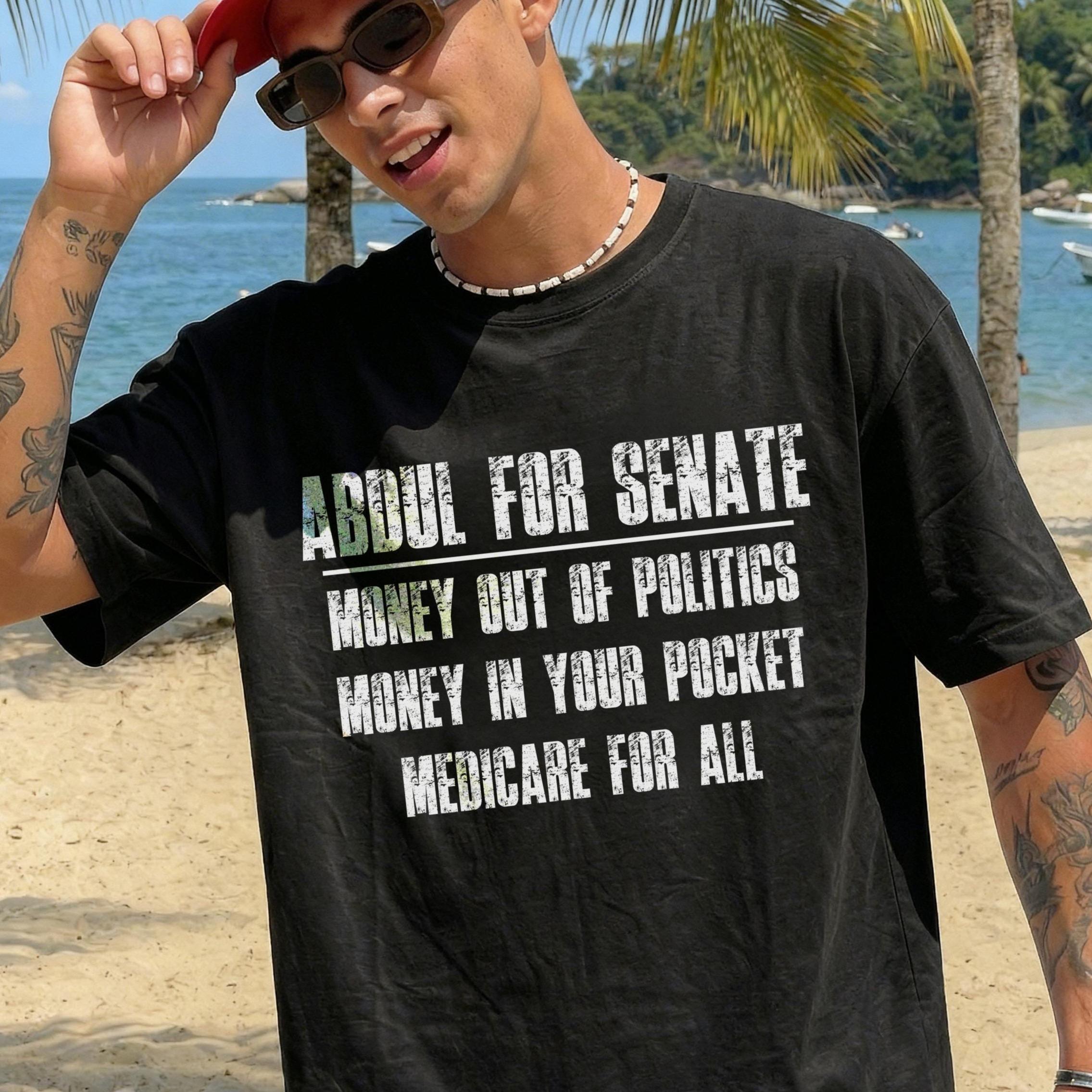 Black t-shirt with text: &amp;quot;ABDUL FOR SENATE MONEY OUT OF POLITICS MONEY IN YOUR POCKET MEDICARE FOR ALL&amp;quot;