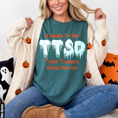 Teal t-shirt with &amp;quot;A Decade Of Him PTSD Trump Traumatic Stress Disorder&amp;quot; text.