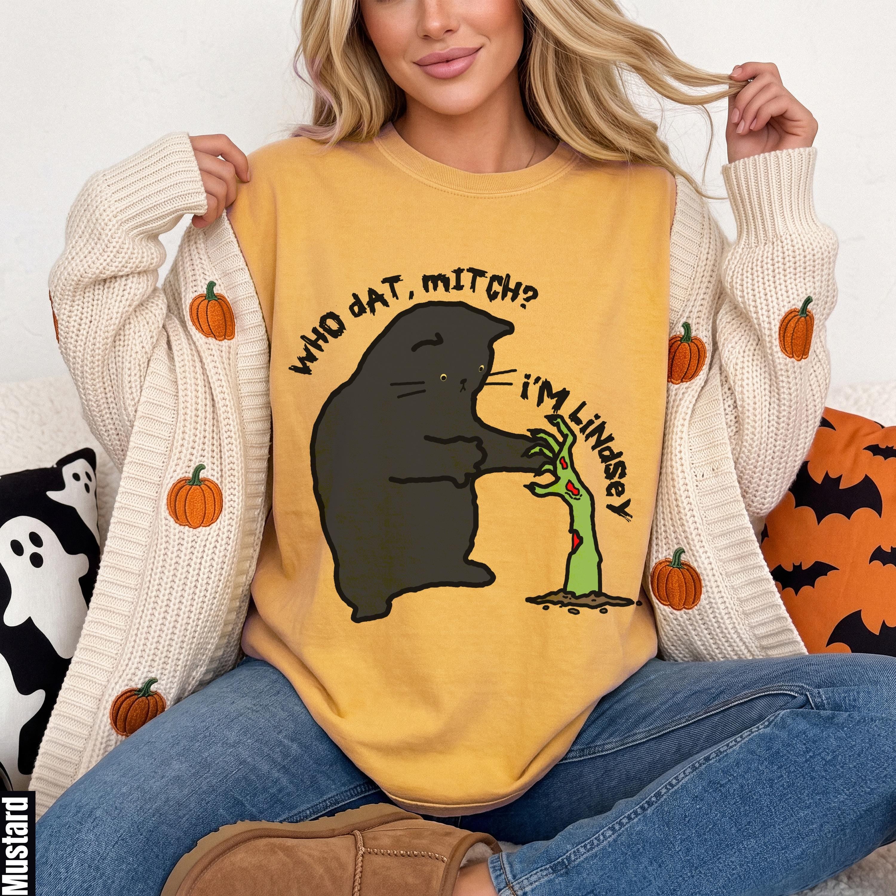 Yellow t-shirt with black cat and zombie graphic, &amp;quot;WHO DAT, MITCH? I&amp;