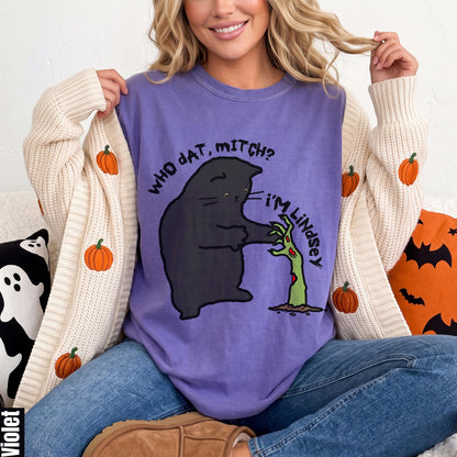 Purple t-shirt with black cat graphic that says &amp;quot;Who dat Mitch? I&amp;
