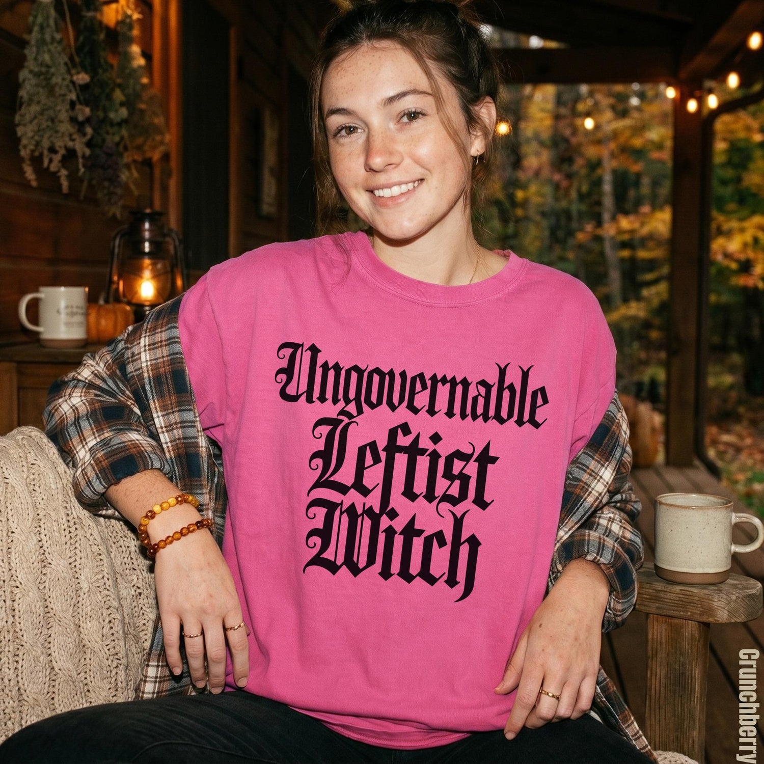 Pink t-shirt with gothic text: Ungovernable Leftist Witch.