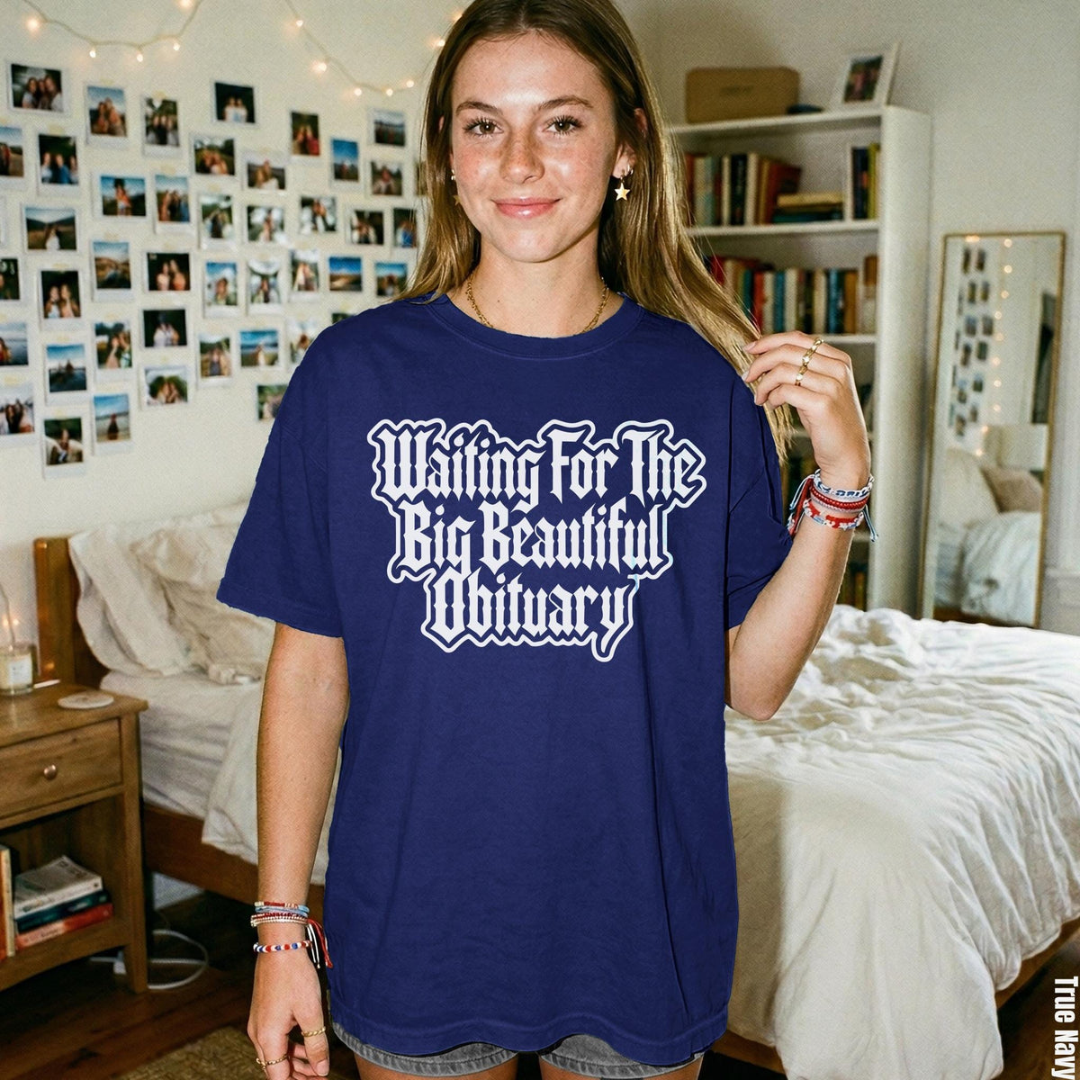 Navy t-shirt with white gothic text &amp;quot;Waiting For The Big Beautiful Obituary&amp;quot;