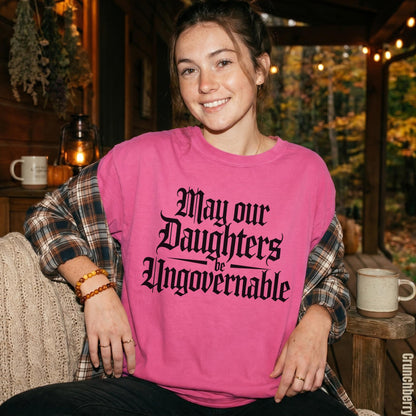 Pink sweatshirt with &amp;quot;May our Daughters be Ungovernable&amp;quot; in gothic font.