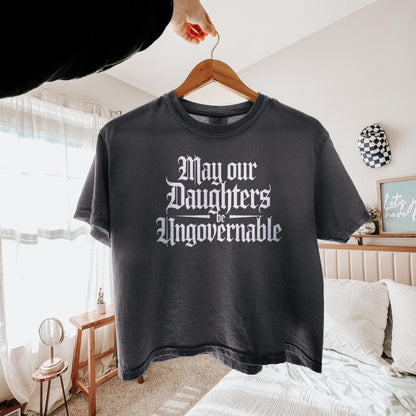 Dark gray t-shirt with &amp;quot;May our Daughters be Ungovernable&amp;quot; text in white gothic font.