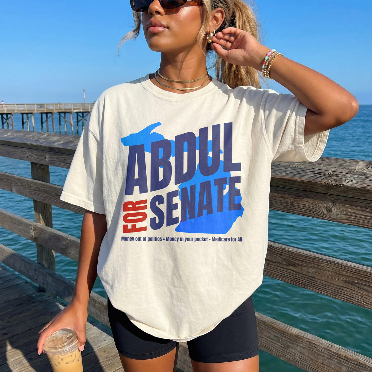 Shirt with &amp;quot;ABDUL FOR SENATE&amp;quot; in blue and red text over a Michigan-shaped graphic.