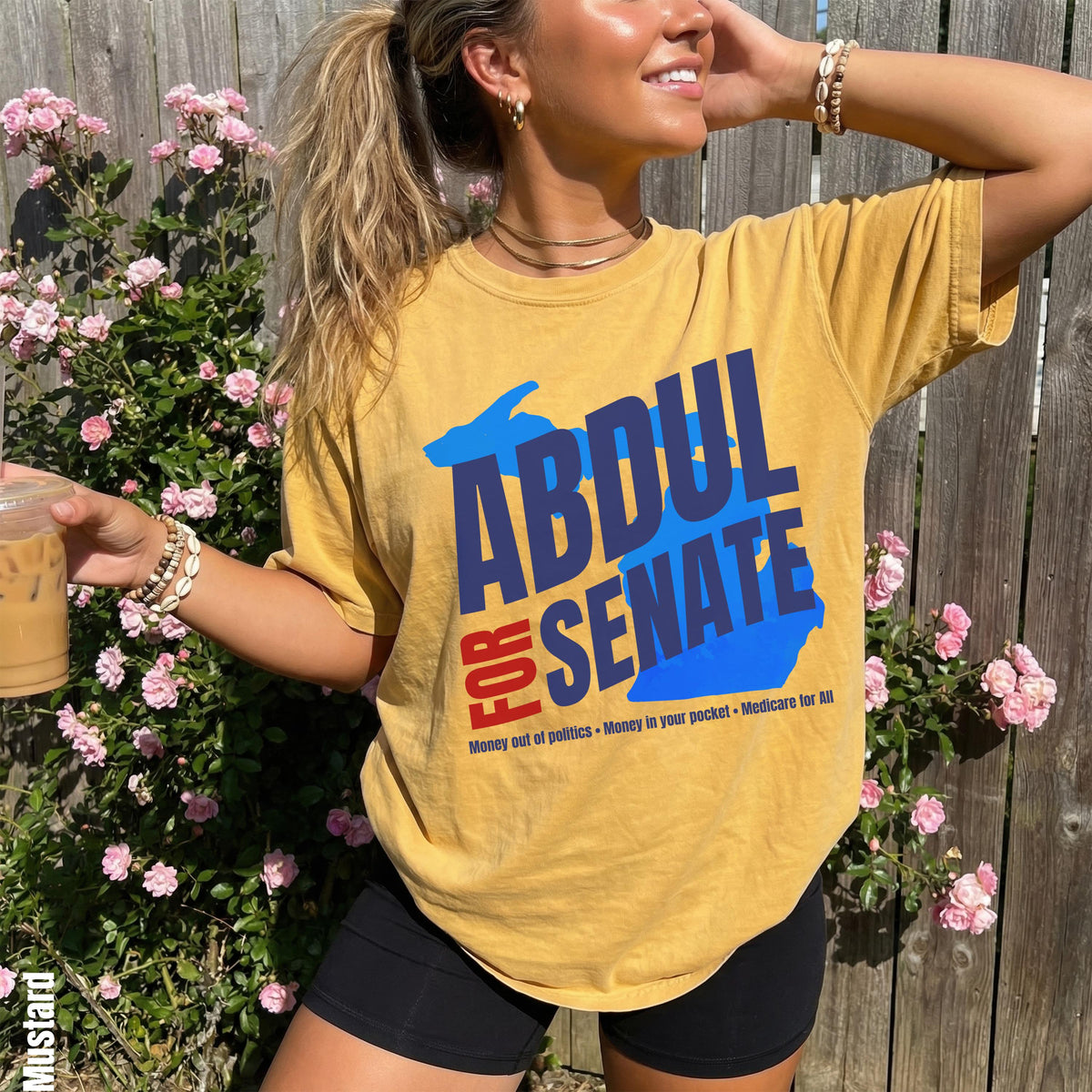 Yellow t-shirt with &amp;quot;ABDUL FOR SENATE&amp;quot; text and campaign slogans.