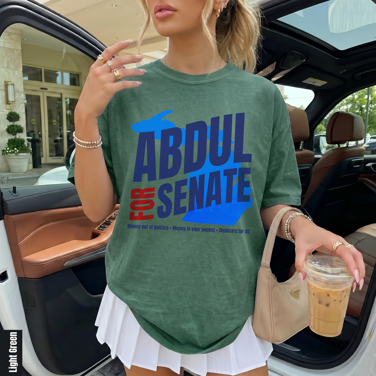 Green t-shirt with &amp;quot;ABDUL FOR SENATE&amp;quot; and policy slogans.