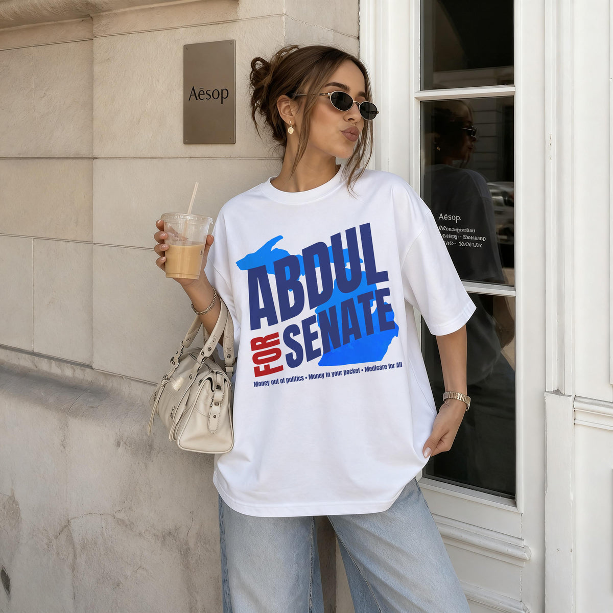 White t-shirt with &amp;quot;Abdul for Senate&amp;quot; graphic and campaign slogans.