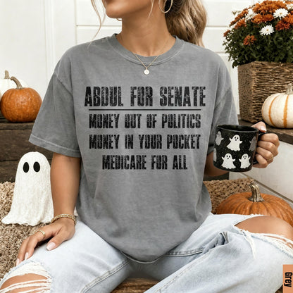 Grey t-shirt with text &amp;quot;Abdul for Senate Money Out of Politics Money in Your Pocket Medicare For All&amp;quot;.