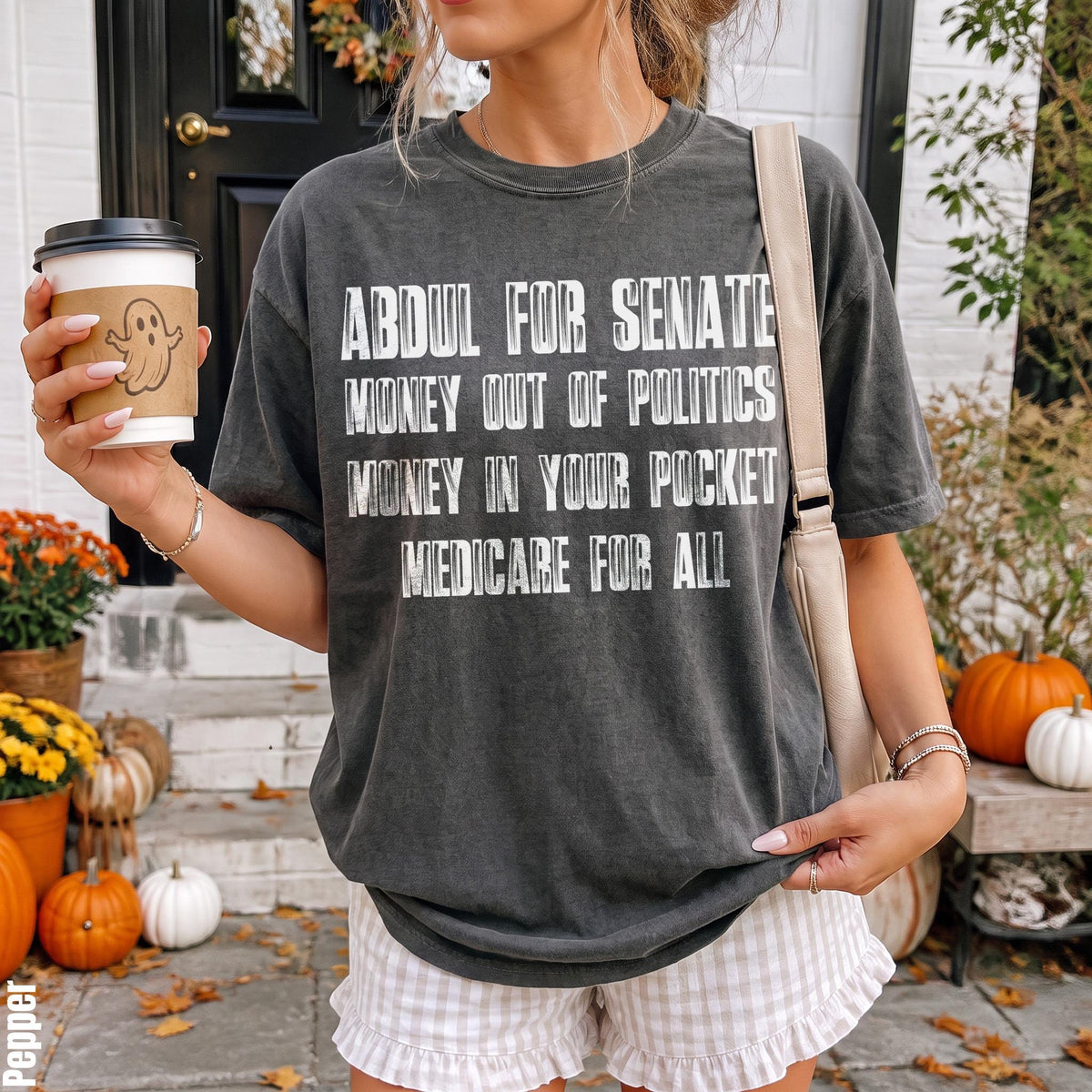 Dark grey t-shirt with text &amp;quot;ABDUL FOR SENATE MONEY OUT OF POLITICS&amp;quot;.