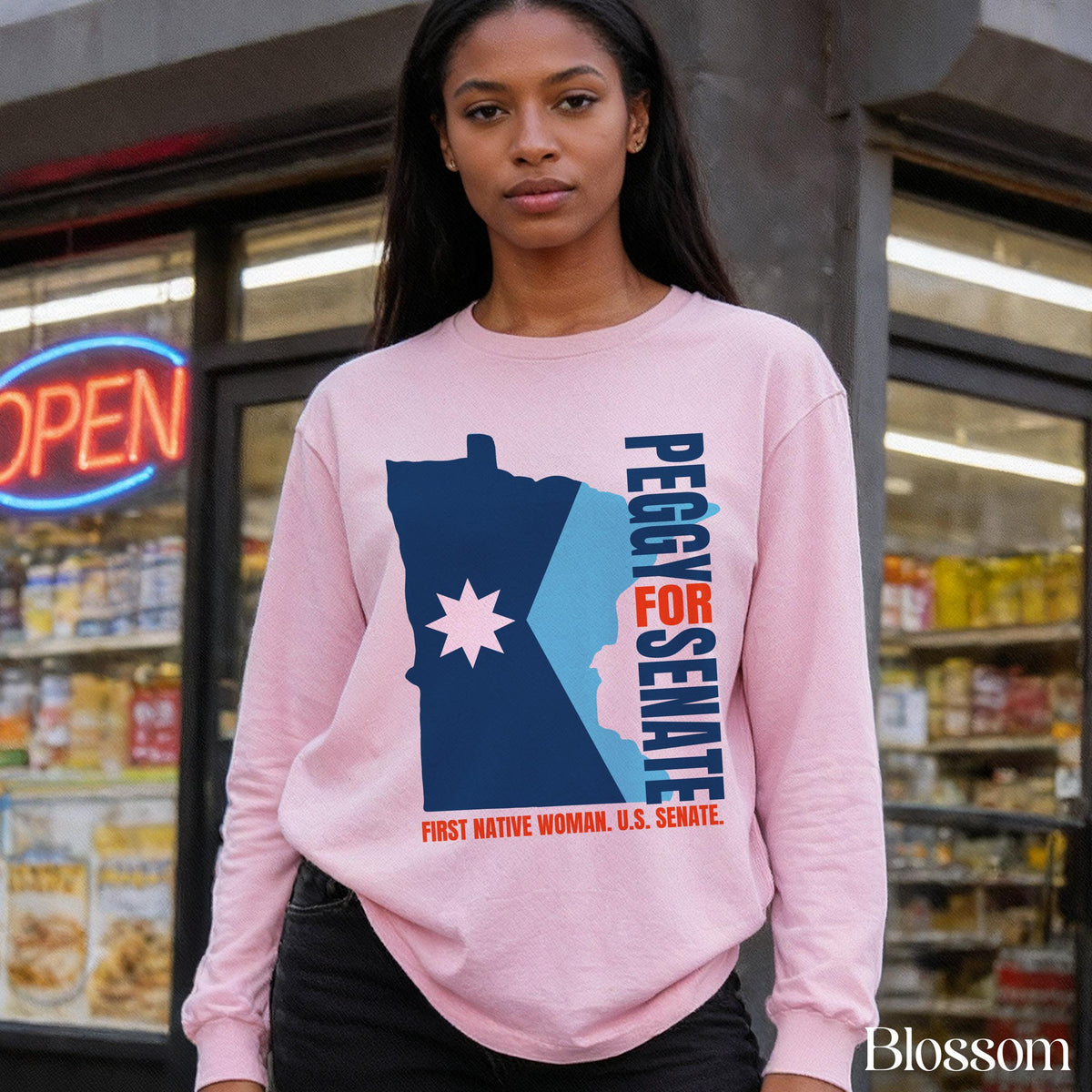 Pink sweatshirt with &amp;quot;Peggy for Senate First Native Woman U.S. Senate&amp;quot; graphic.