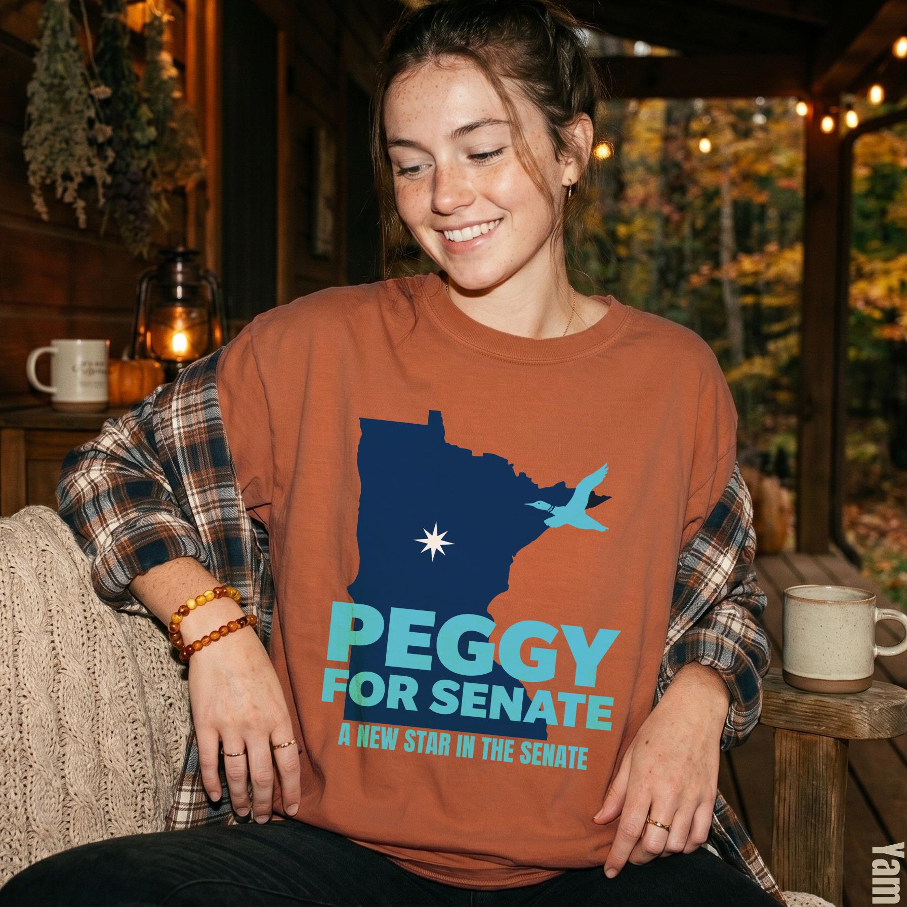 Brown t-shirt with &amp;quot;PEGGY FOR SENATE&amp;quot; and a Minnesota outline graphic.