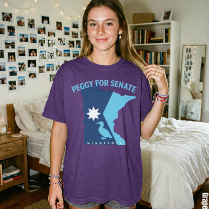 Purple t-shirt with &amp;quot;Peggy for Senate Minnesota&amp;quot; text and Minnesota map graphic.