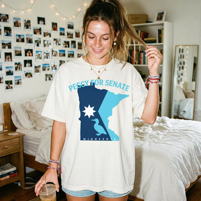 Cream t-shirt with &amp;quot;Peggy for Senate&amp;quot; text and Minnesota map graphic.