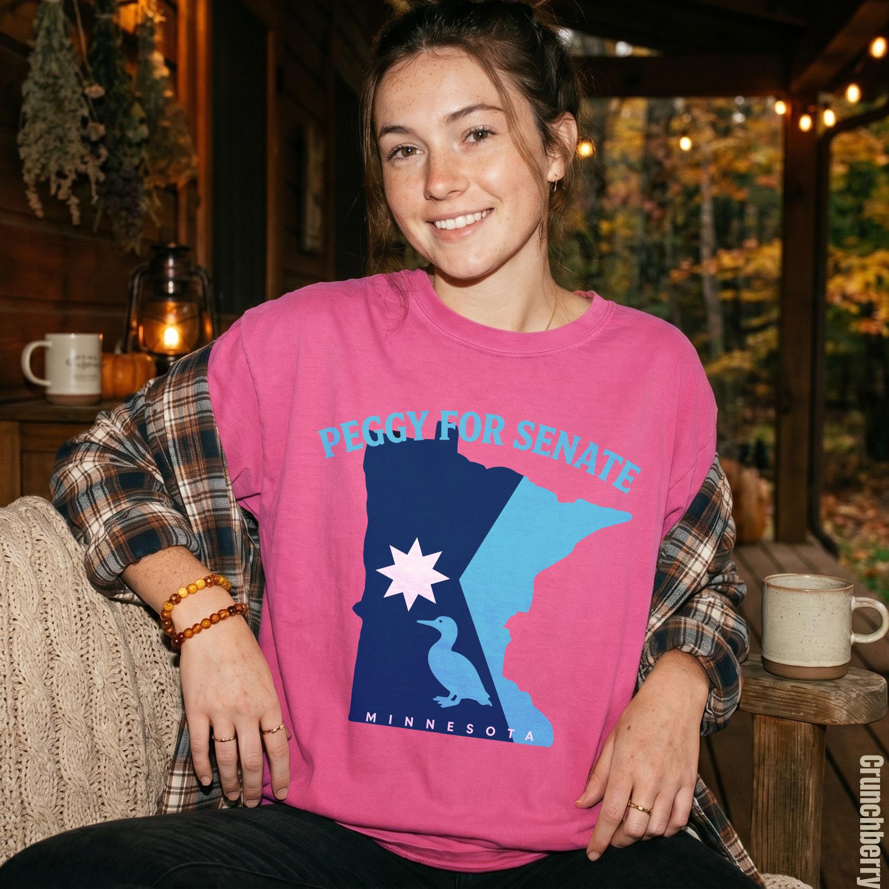Pink t-shirt with &amp;quot;Peggy for Senate&amp;quot; text and Minnesota outline graphic.