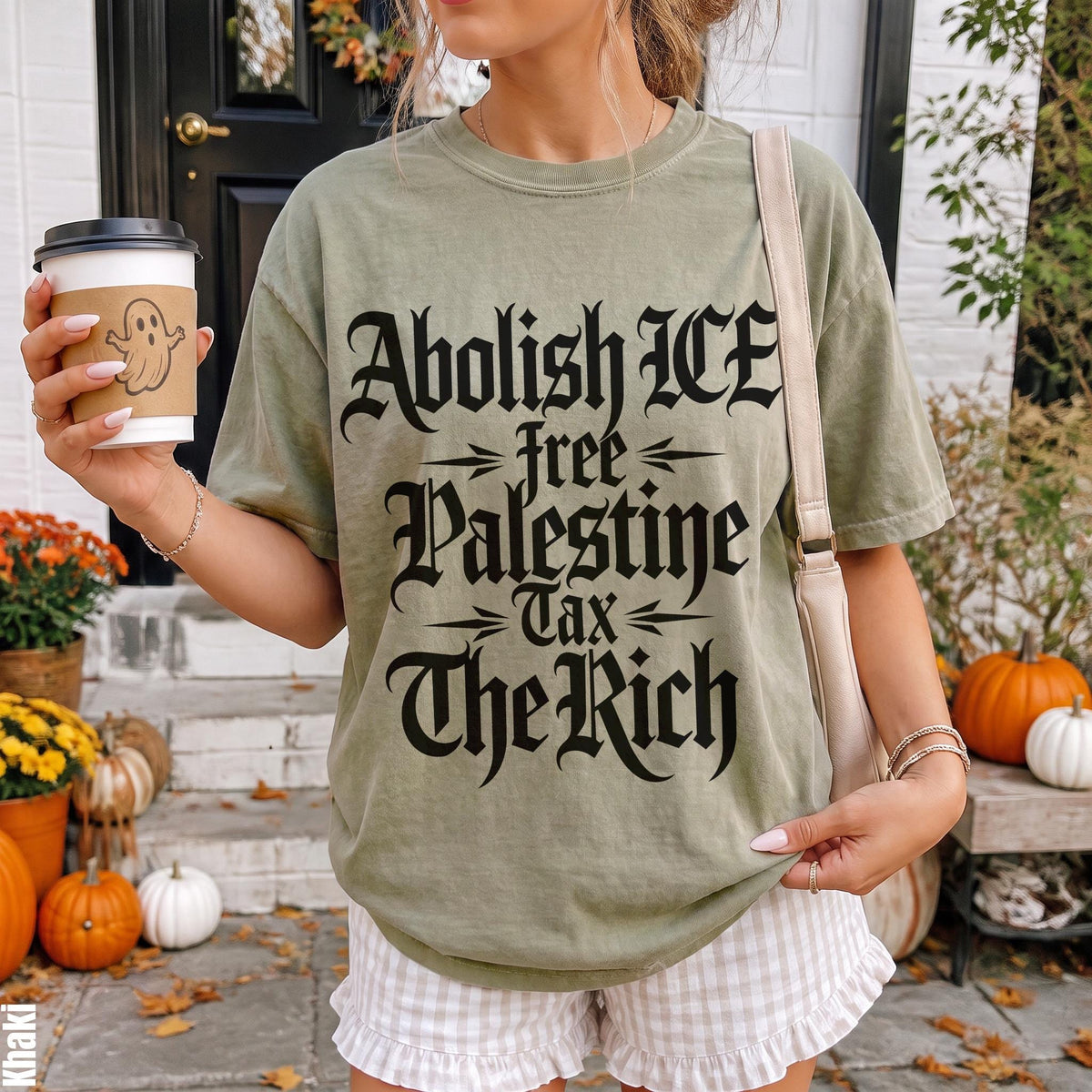 Green t-shirt with text &amp;quot;Abolish ICE free Palestine Tax The Rich&amp;quot;.