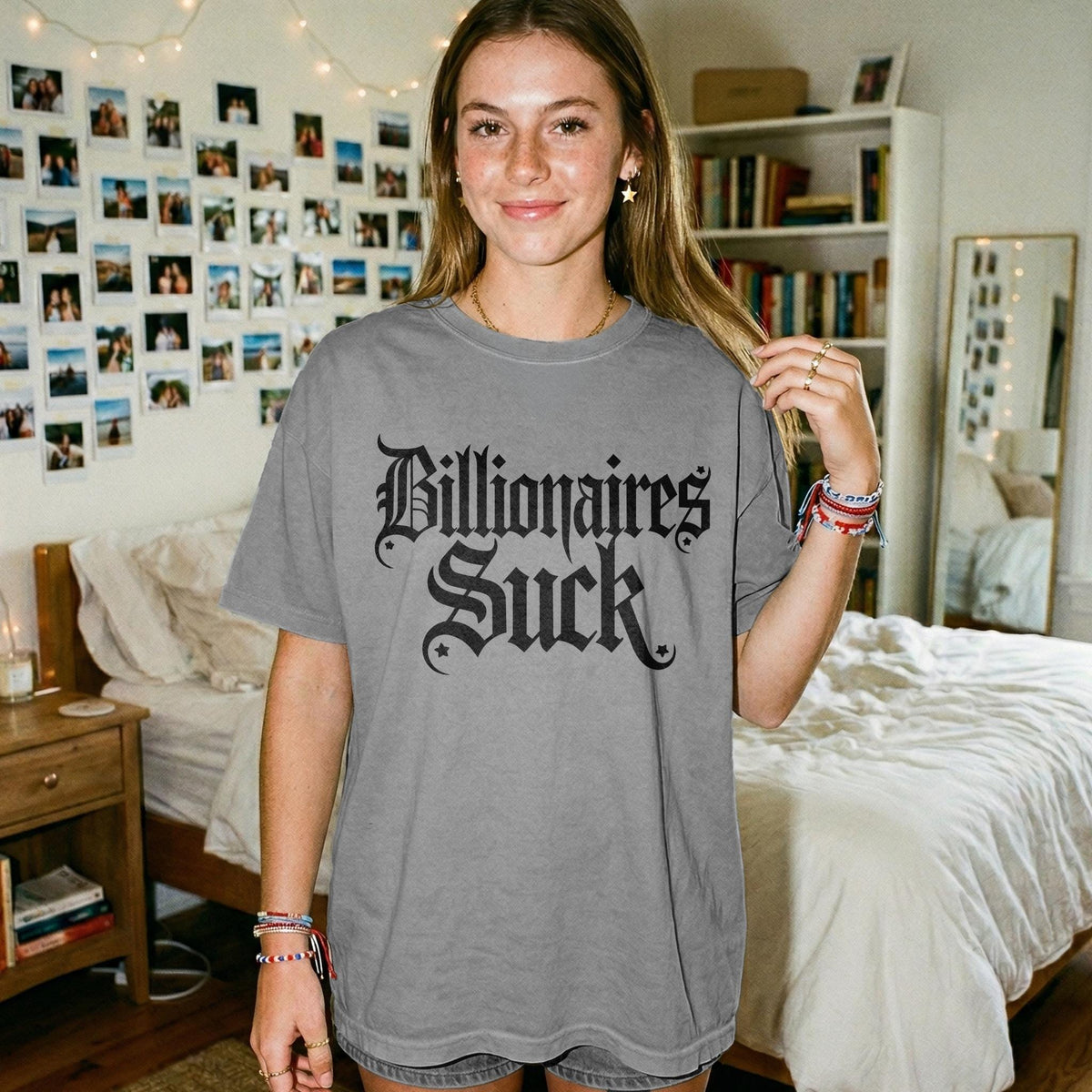 Gray t-shirt with &amp;quot;Billionaires Suck&amp;quot; in gothic font, worn by a young woman.