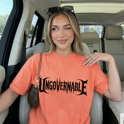 Orange t-shirt with &amp;quot;UNGOVERNABLE&amp;quot; text and a woman in a car.