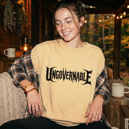 Yellow t-shirt with &amp;quot;UNGOVERNABLE&amp;quot; in gothic font, worn by a smiling woman.
