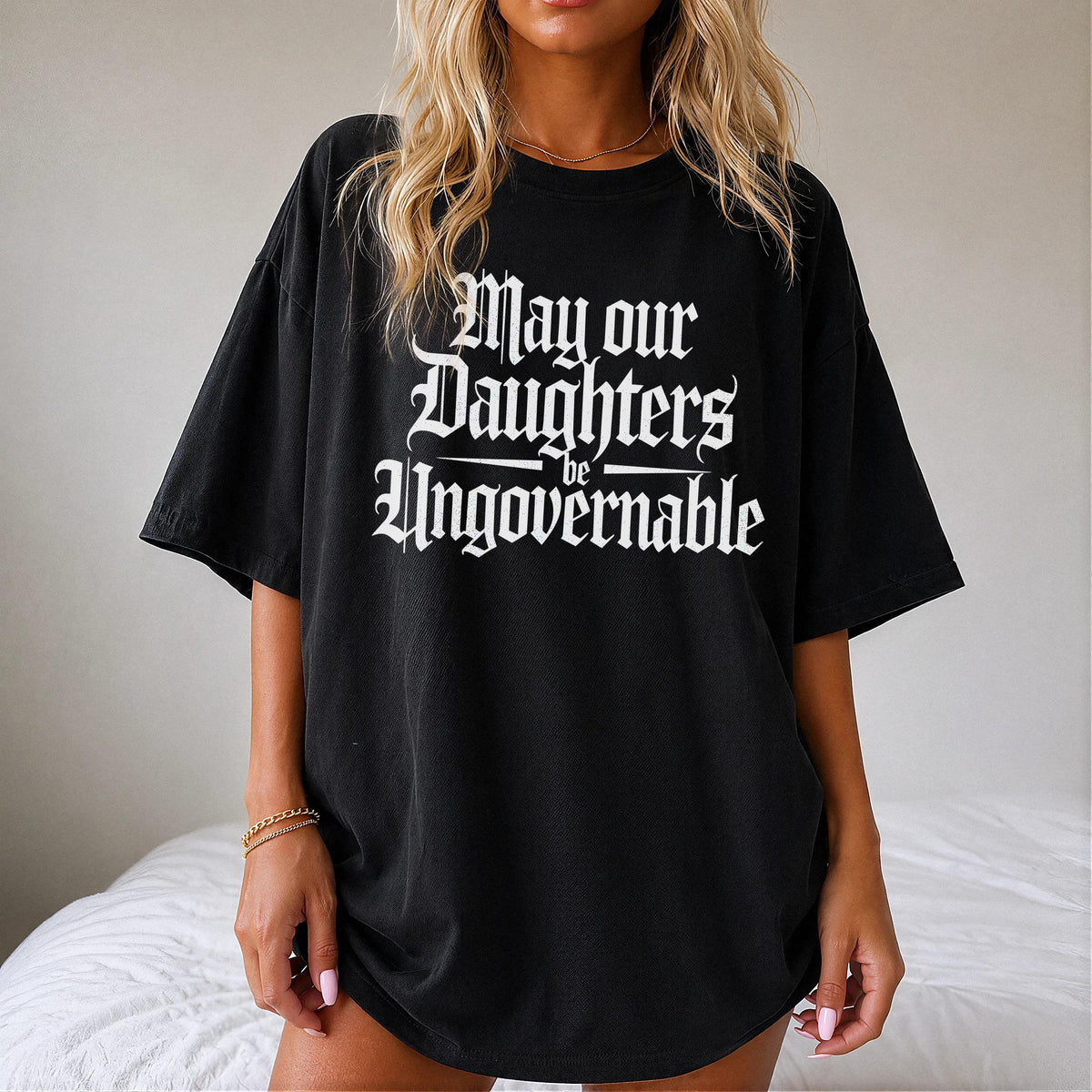 Black t-shirt with gothic text reading &amp;quot;May our Daughters be Ungovernable.&amp;quot;
