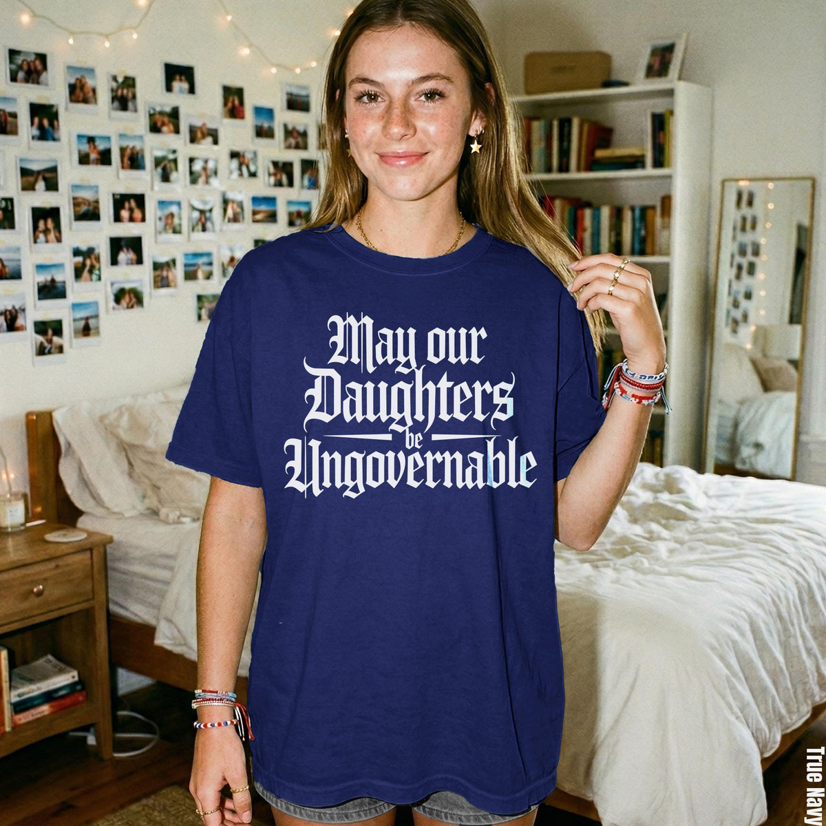 Navy t-shirt with white gothic text &amp;quot;May our Daughters be Ungovernable&amp;quot;.
