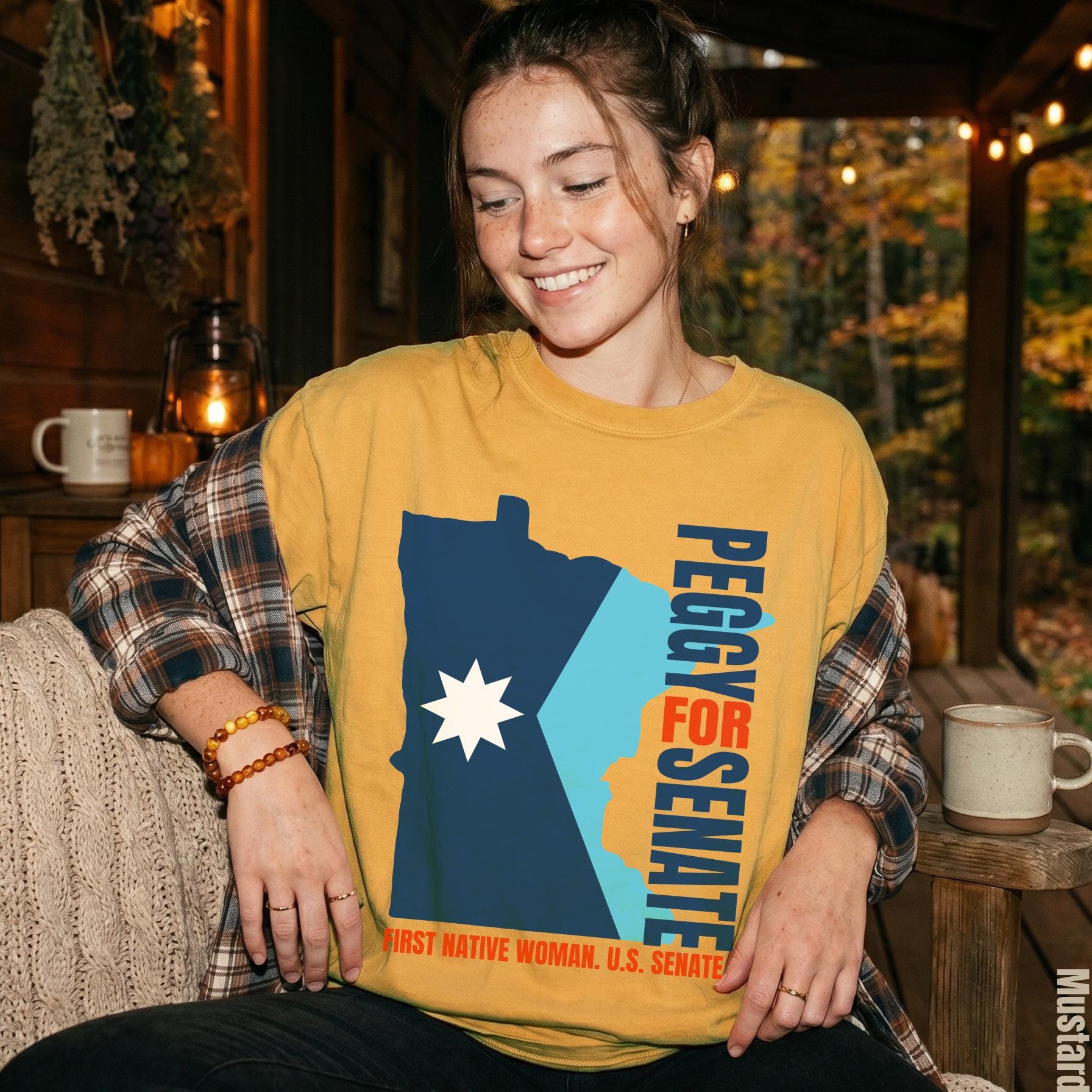 Yellow shirt with Minnesota outline and &amp;quot;Peggy for Senate&amp;quot; text.