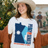 White t-shirt with blue state outline and "Peggy for Senate" text.