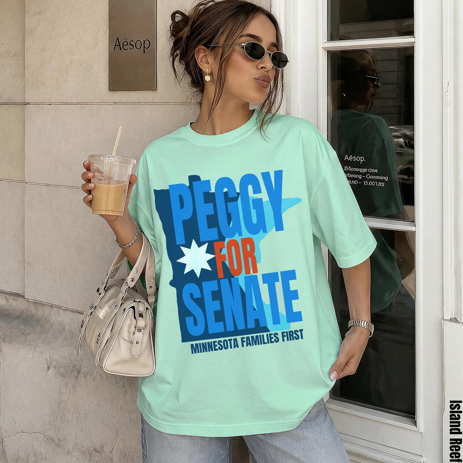 Mint green t-shirt with &amp;quot;Peggy For Senate Minnesota Families First&amp;quot; graphic.