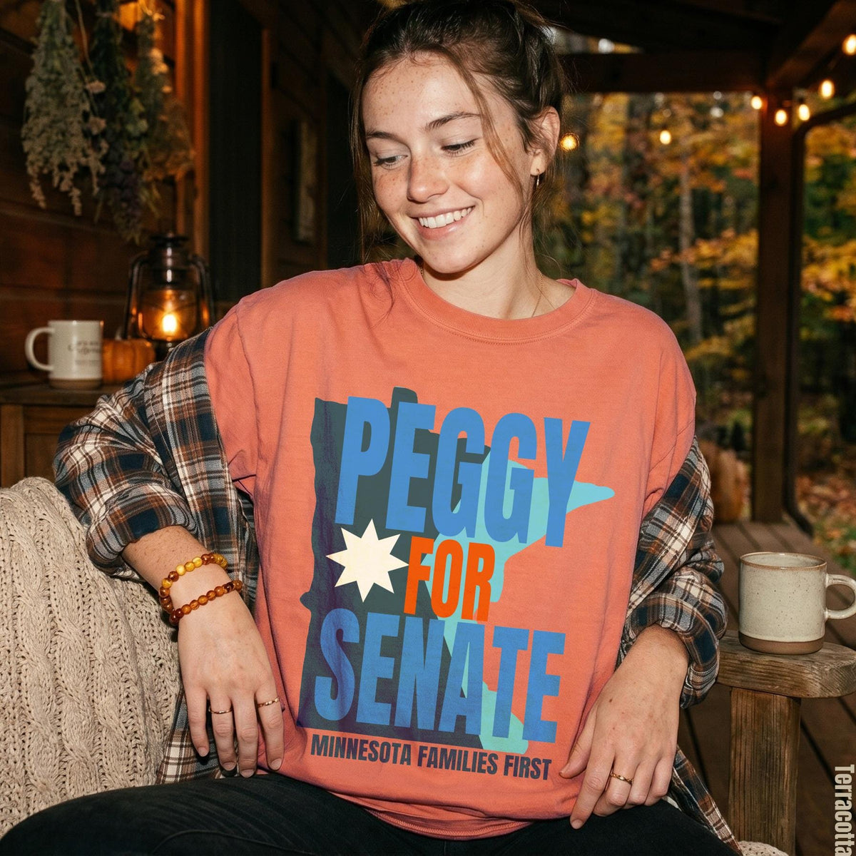 T-shirt with &amp;quot;Peggy for Senate Minnesota Families First&amp;quot; text and Minnesota outline.