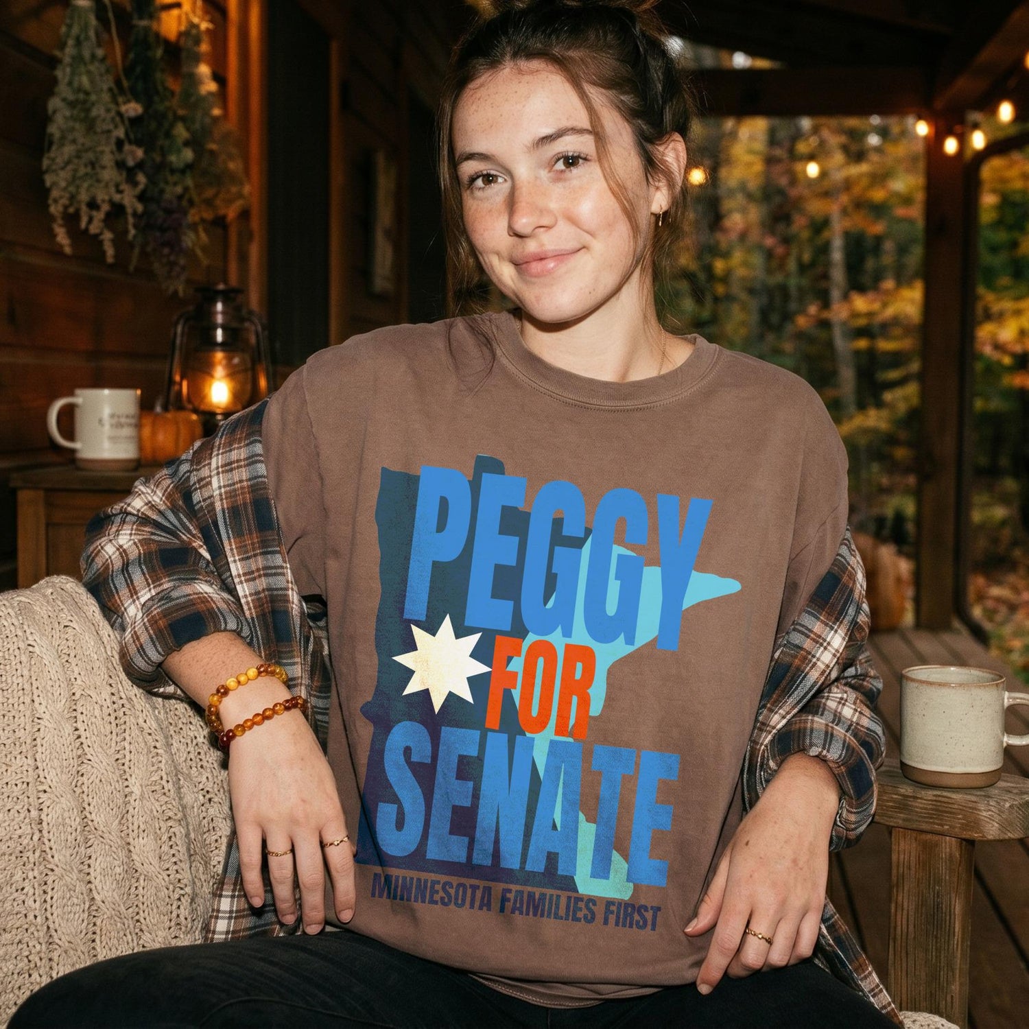 Brown t-shirt with &amp;quot;PEGGY FOR SENATE&amp;quot; and &amp;quot;MINNESOTA FAMILIES FIRST&amp;quot; text.