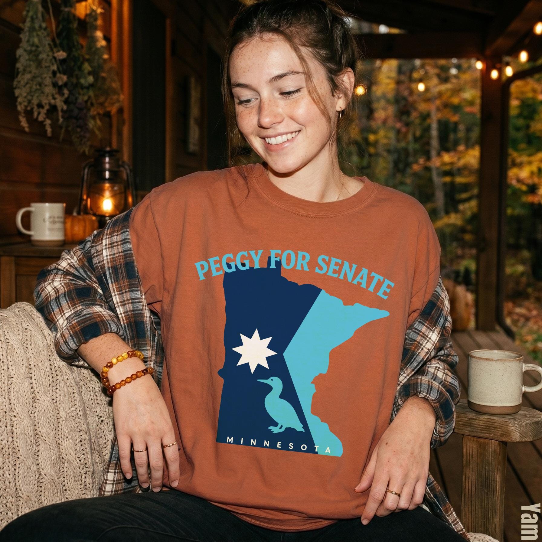 Shirt with &amp;quot;Peggy for Senate Minnesota&amp;quot; text and Minnesota outline graphic.