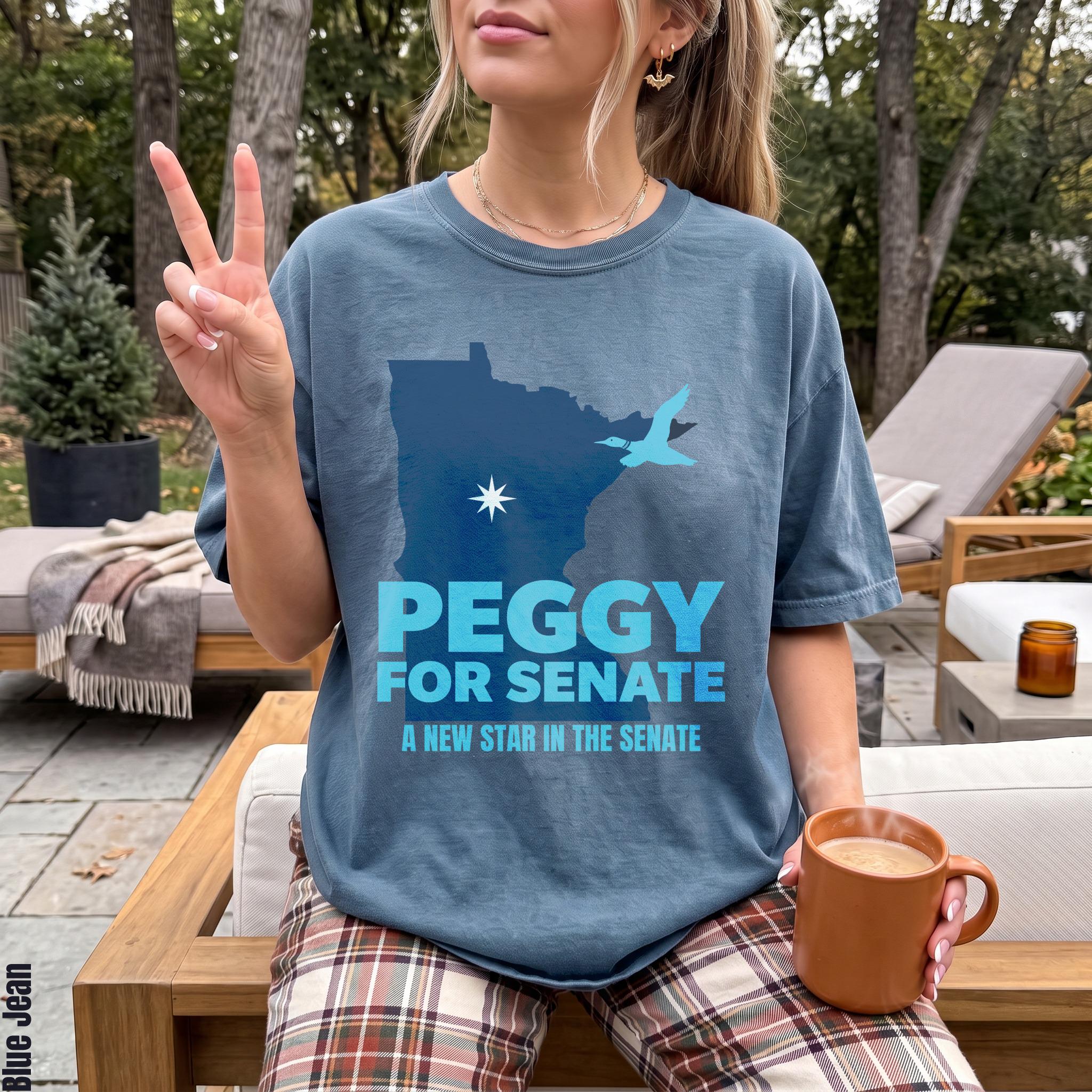 Blue t-shirt with Minnesota outline, text &amp;quot;Peggy For Senate&amp;quot;, and a bird graphic.