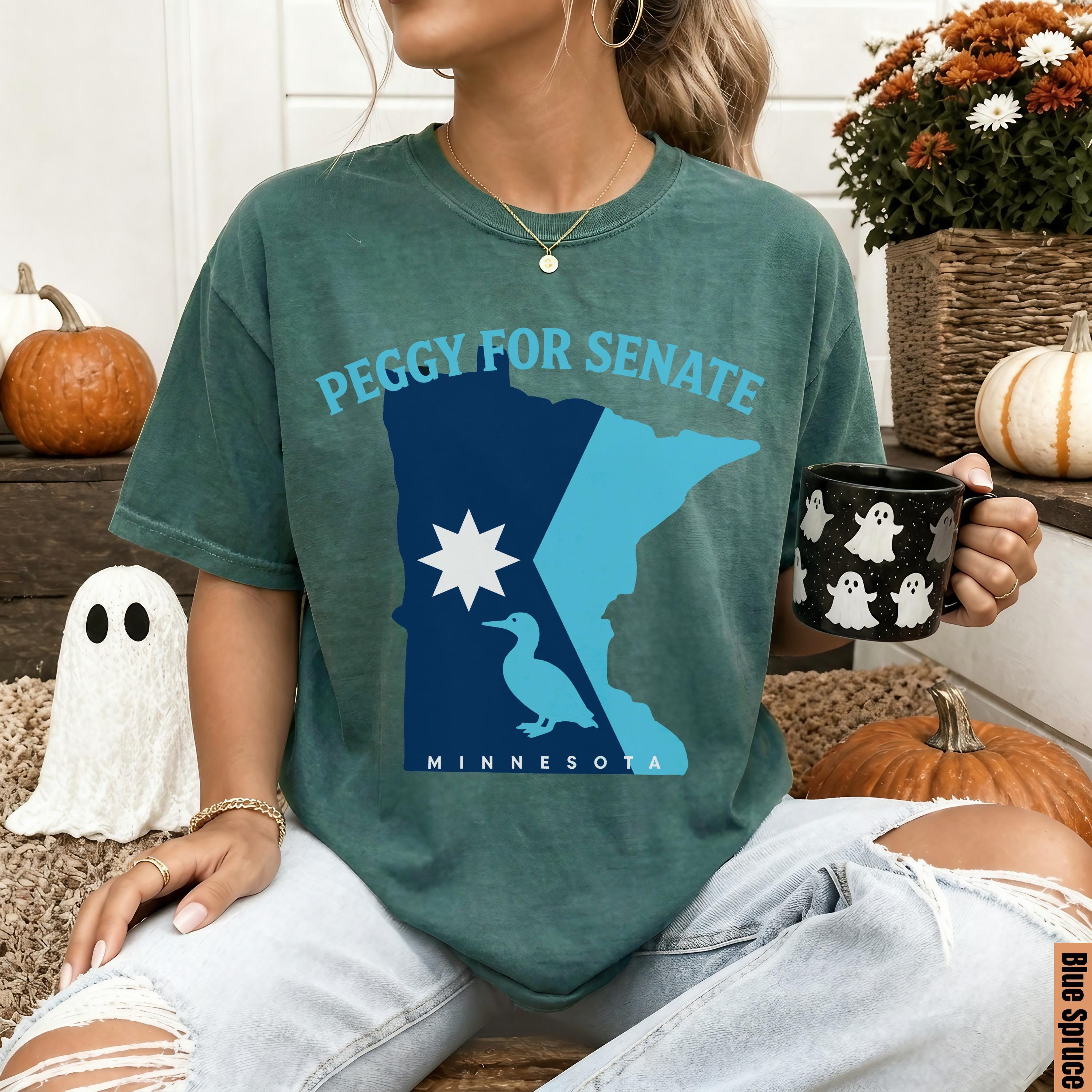 Green t-shirt with Minnesota map graphic and &amp;quot;Peggy for Senate&amp;quot; text.