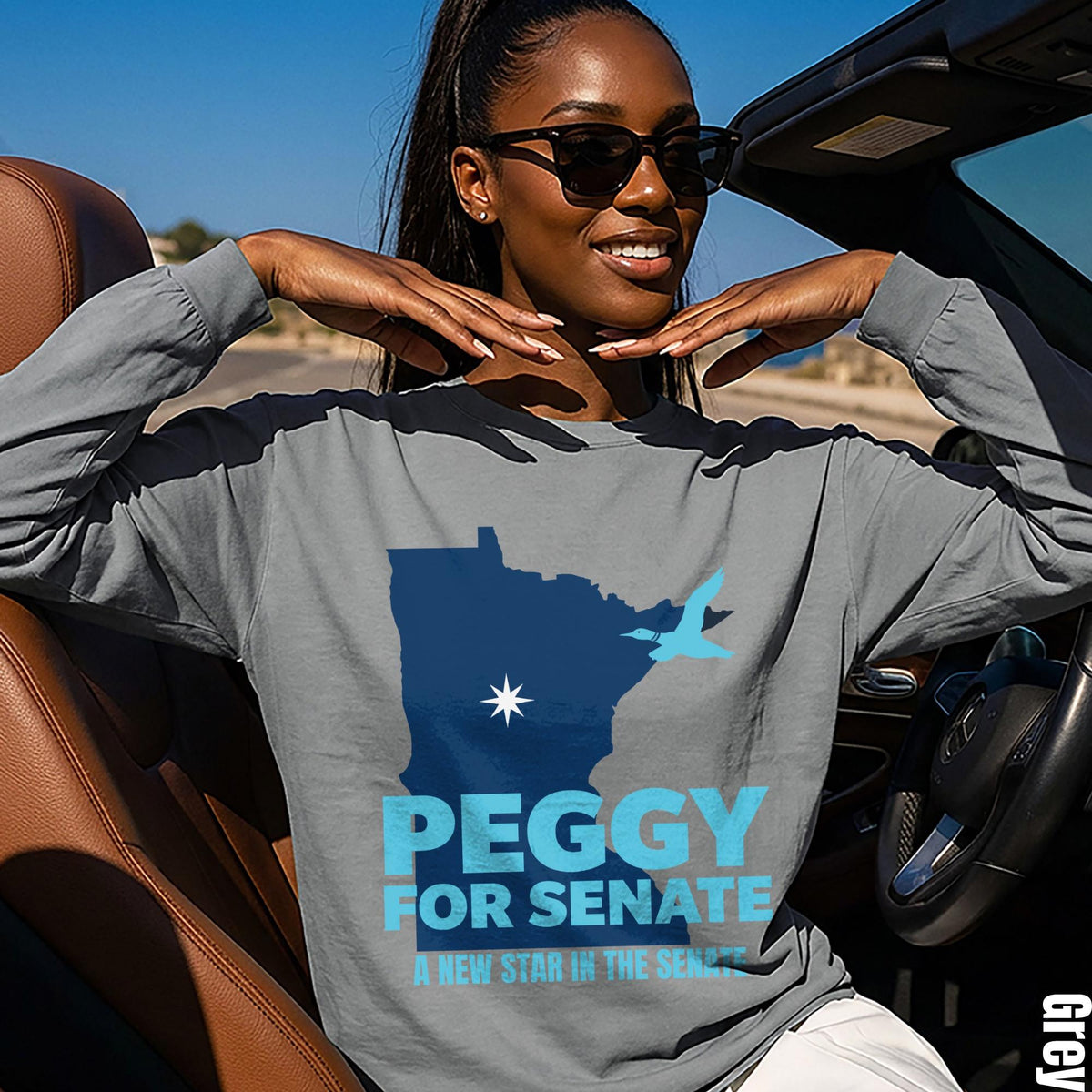 Grey long sleeve shirt with Minnesota outline, &amp;quot;Peggy for Senate,&amp;quot; and a bird graphic.