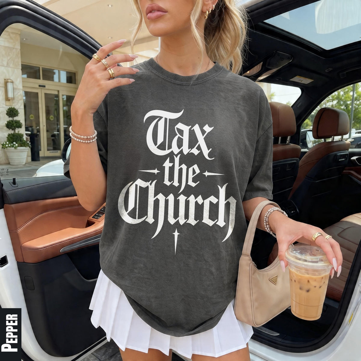 Dark grey t-shirt with white text &amp;quot;Tax the Church&amp;quot; in gothic font.