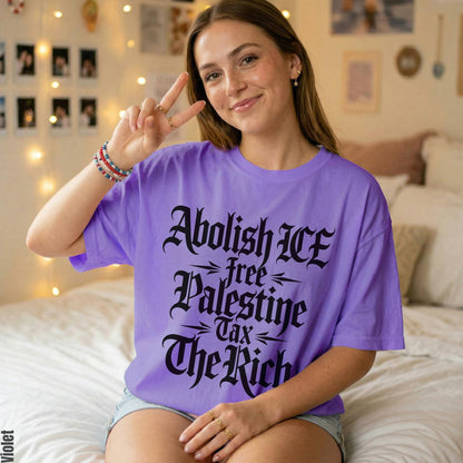 Purple t-shirt with text: Abolish ICE, Free Palestine, Tax The Rich.