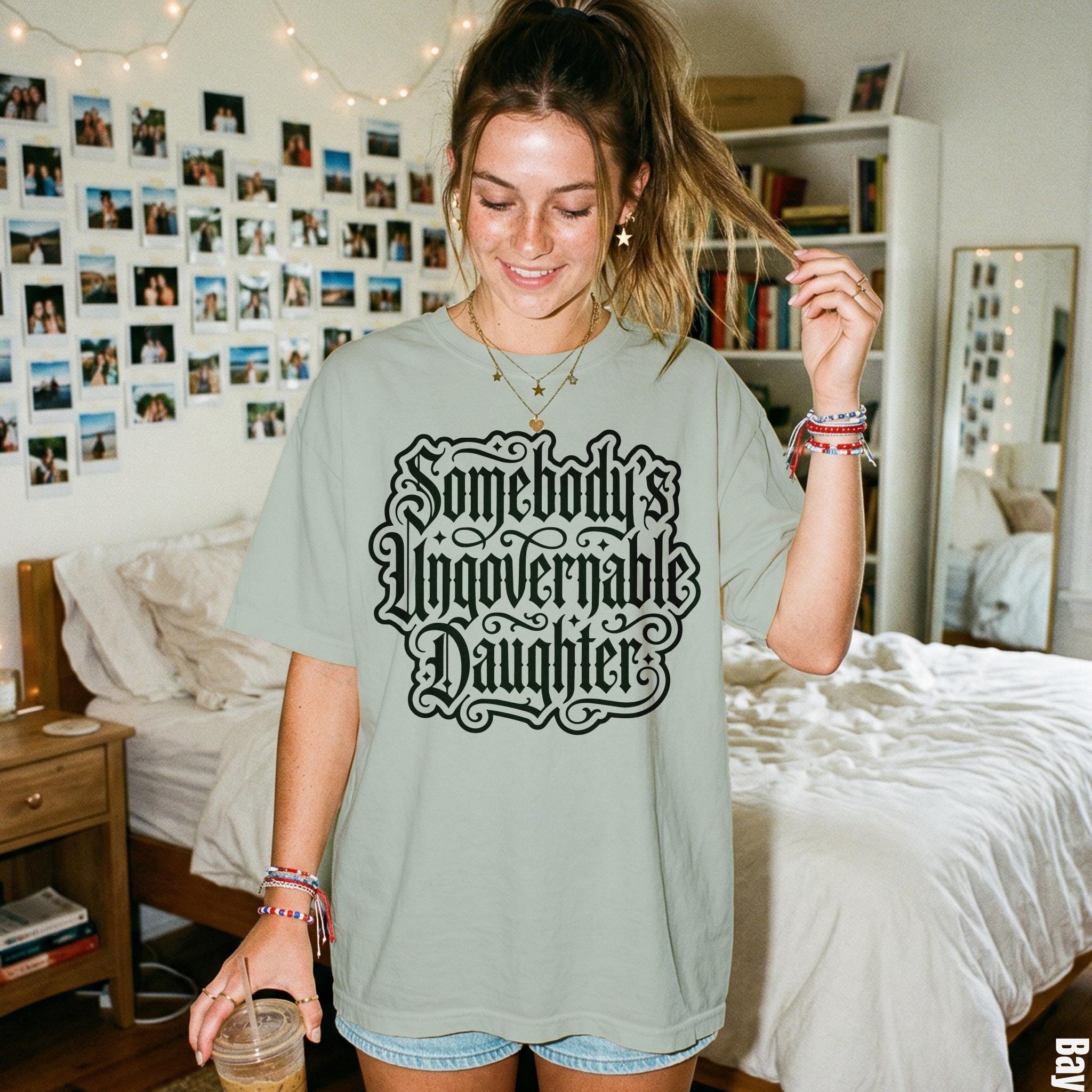 Light green t-shirt with &amp;quot;Somebody&amp;