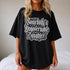 Black t-shirt with white text reading "Somebody&