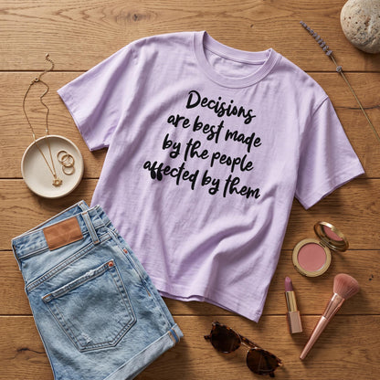 Light purple t-shirt with &amp;quot;Decisions are best made by the people affected by them&amp;quot; text.