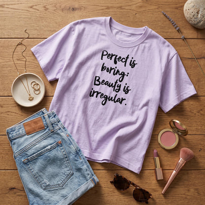 Lavender t-shirt with black text &amp;quot;Perfect is boring: Beauty is irregular.&amp;quot;