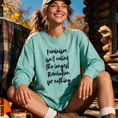 Mint green long-sleeve shirt with &amp;quot;Feminism isn&amp;